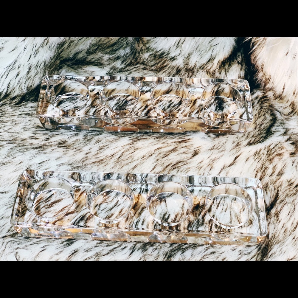 Two clear glass tea light candle holders